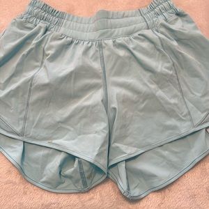 Lululemon blue shorts size 6 Tall. Small stain on the bottom under leg area.